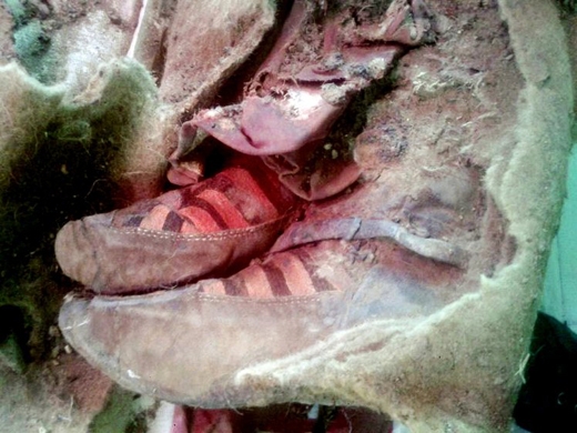 Archaeologists discovered the partial remains of a female thought to have died over a millennium ago and nearly 10,000 feet 